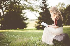 Picture of girl reading outside