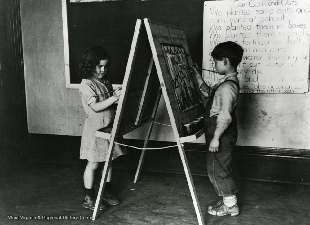 First graders painting at school in Arthurdale. Courtesy of West Virginia & Regional History Center.  